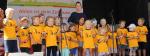 Mit drei Tänzen begeisterten die Kinder der Awo-Kita Menzelstraße in sonnengelben T-Shirts das Publikum. Foto: Angelika Knöpker
